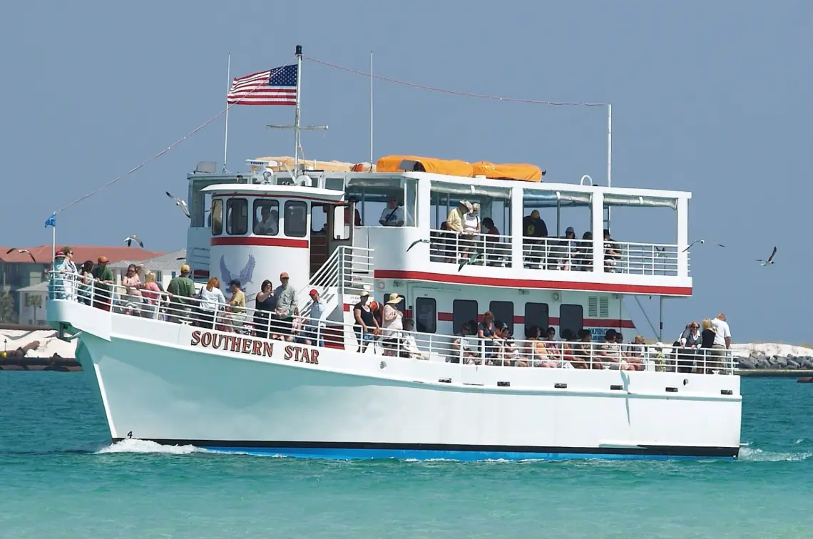 Dolphin cruise boat in the calm protected waters of Destin harbor